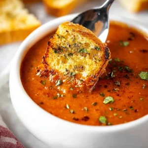 Roasted tomato basil soup in a bowl. Creamy, flavorful, and homemade.