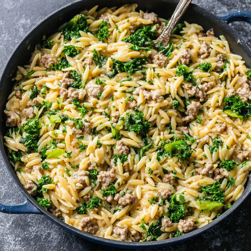 Ground Turkey Orzo Skillet ready to serve in a cast iron skillet, showcasing the delicious and simple one-pan meal.